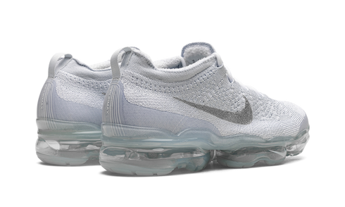 Close-up of Nike VaporMax 2023 Flyknit sneaker details in White/Sky Grey