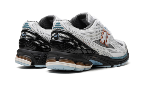 New Balance 1906R sneaker in White Black Copper colorway – side view