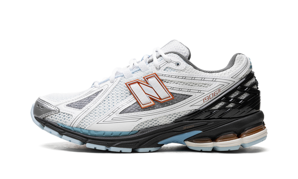 New Balance 1906R sneaker in White Black Copper colorway – side view