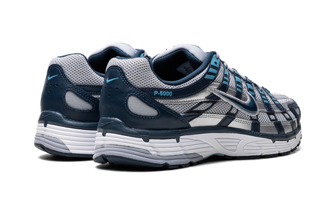 Nike P-6000 Armory Navy and Flat Silver sneaker with mesh and leather layers, available at ASEY SHOP Morocco.