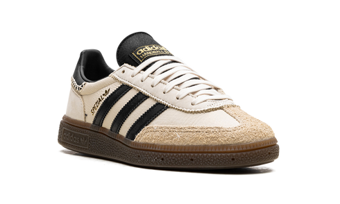 Adidas Handball Spezial WMNS in Wonder White Black, classic white and black sneaker, available at ASEY SHOP Morocco.