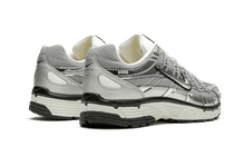 Charger l&#39;image dans la galerie, Nike P-6000 Metallic Silver sneaker with mesh and leather overlays, available at ASEY SHOP Morocco.


