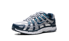 Charger l&#39;image dans la galerie, Nike P-6000 Armory Navy and Flat Silver sneaker with mesh and leather layers, available at ASEY SHOP Morocco.
