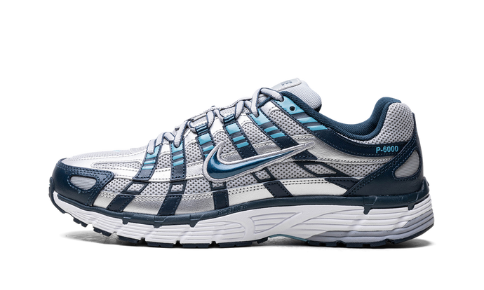 Nike P-6000 Armory Navy and Flat Silver sneaker with mesh and leather layers, available at ASEY SHOP Morocco.